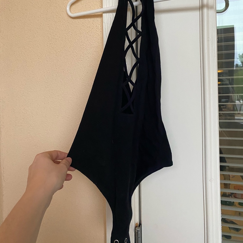 Criss cross body suit
